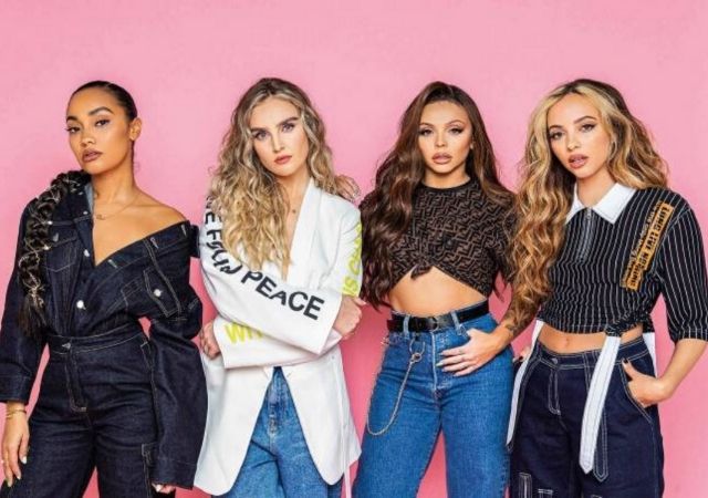 Integrantes do grupo Little Mix, que lançaram o álbum Confetti, posam em fundo rosa uma ao lado da outra